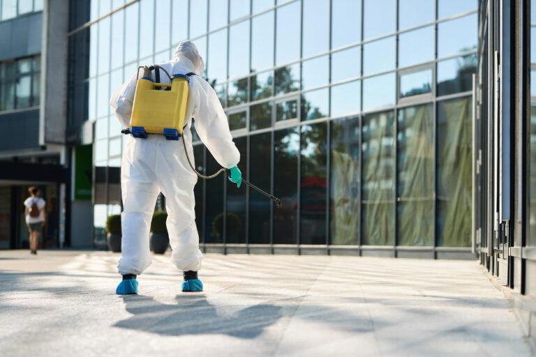 Property manager reviewing commercial pest control report from Deanza Termite & Pest Control